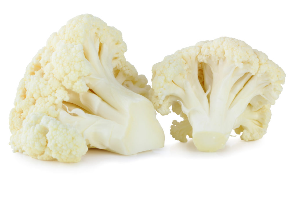 Isolated image of two stalks of cauliflower on white